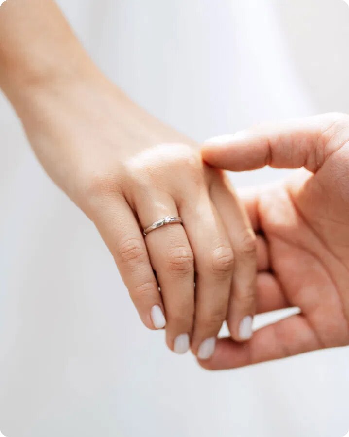 Curved, diamond women's wedding rings.